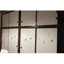 新しい襖はミッキーの柄をアクセントに。畳、襖に加え、障子25枚を貼替えました。
