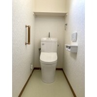 便器交換と立ち上がり補助のグリップを設置したリフォーム