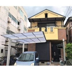 外壁塗装・屋根かぶせ葺き・カーポート・テラス屋根の新設を行いました。