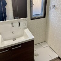 洗面台を小さくして室内に洗濯機置場を新設する洗面所リフォーム