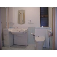 洗面・トイレを一緒にし、青を基調に清潔で使いやすいスペースに