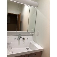 収納たっぷりピンクの洗面台にリフォーム