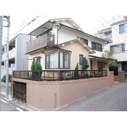 モルタル外壁に金属サイディング上張り、屋根も金属屋根をカバー工法で