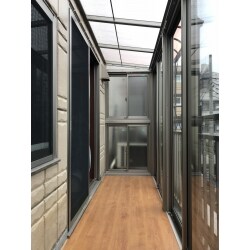 ３階建て住宅の３階バルコニーにサンルームを設けました。