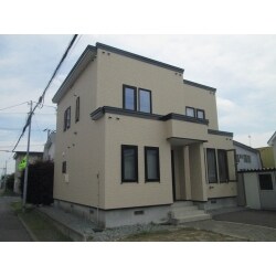 やさしい色合いでまとめたナチュラルな外壁