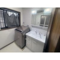 浴室ドアの破損をきっかけに洗面室もリフォーム