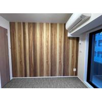 木の温かみと石の高級感など素材を生かしてリフォーム