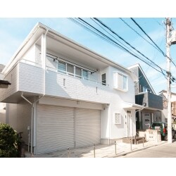 屋根・外壁の塗装で白く輝くお家に