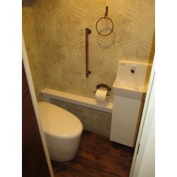 お客様こだわりの内装でトイレをアンティークフレンチ風にリフォームしました。