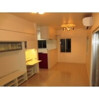 L型キッチンと、収納があるリビングへのリ戸建ノベーション