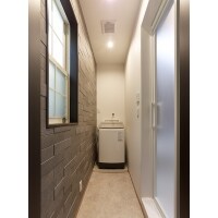 火災による一部損傷からリフォームを決意【脱衣場・洗濯機置場】