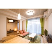 休日を夫婦で過ごす、広々とした落ち着くリビングの実現