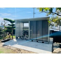 古い物置や植栽・灯篭等を撤去し、物置と駐輪場がセットになているクボタのMr.ストックマンを設置