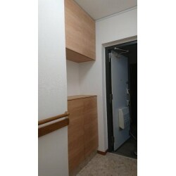 配電盤を小さくし、玄関収納の中に収めてスッキリとさせました。