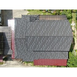 LIXILのTルーフ　モダンで瓦屋根を葺き替えました。