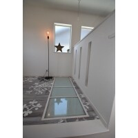 玄関吹き抜け部分を洗濯物を干すスペースへ