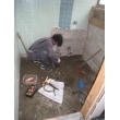 施工中です。浴室解体後、配管移設中です。