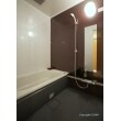浴室はグレー・ブラウン・ホワイトの３色にセンスを感じさせる内装に。設備はTOTOのりモデルバスルームを選ばれ、極力シンプルな内容にしました。
