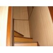 階段の綿壁も、プリント合板で汚れにくく、明るい階段へ！