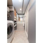 色の統一感で魅せる機能的で美しい洗面室