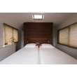 寝室はベッドボードを造作し、間接照明も設置。
まるでデザインホテルのような高級感のある雰囲気に。