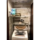 トイレ横のランドリースペースはトイレと同じクロスを使用し統一感を出しました。
