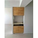 リビングと一体感のある木目調の扉にお化粧直し。