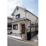クリーム色の外壁に塗り替え