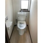 明るく柔らかな印象のトイレ