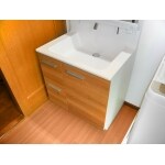 耐水性と使いやすさを兼ね備えた、脱衣場・洗面台リフォーム。