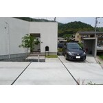 既設建物のデザインに合わせた自転車置き場の増設と外構