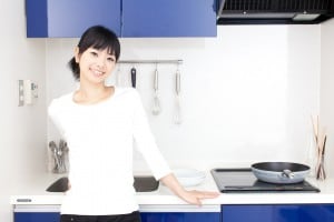 a young asian woman in the kitchen