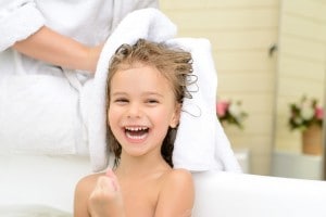 Mother and daughter taking bath